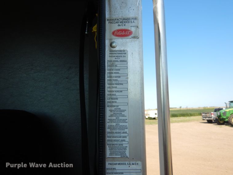 image for item KV9219 2014 Peterbilt 320  refuse truck