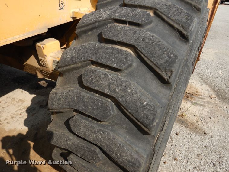 image for item DI6171 1995 John Deere 310D  backhoe