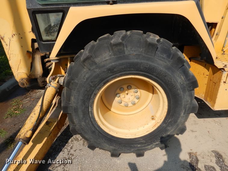 image for item DI6171 1995 John Deere 310D  backhoe