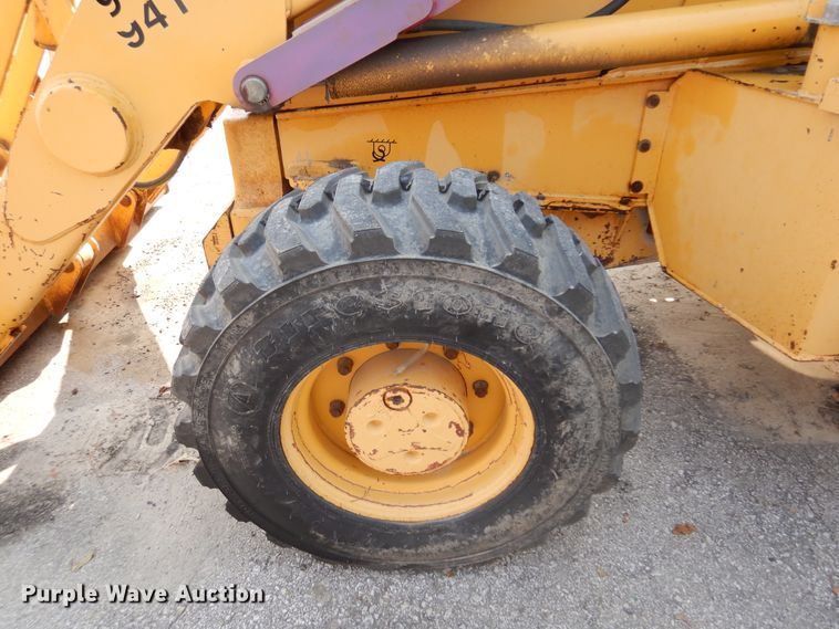 image for item DI6171 1995 John Deere 310D  backhoe