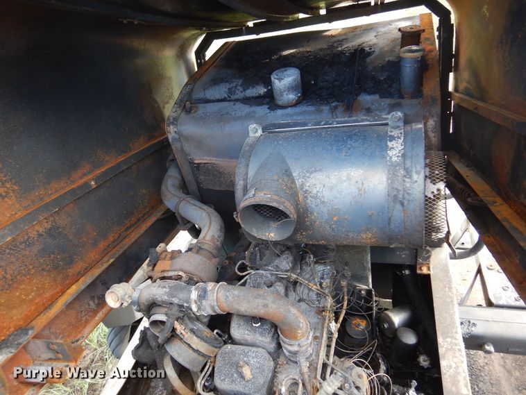 image for item DM5030 1999 Hesston 8550  windrower