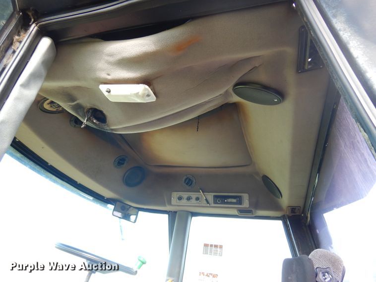 image for item DM5030 1999 Hesston 8550  windrower