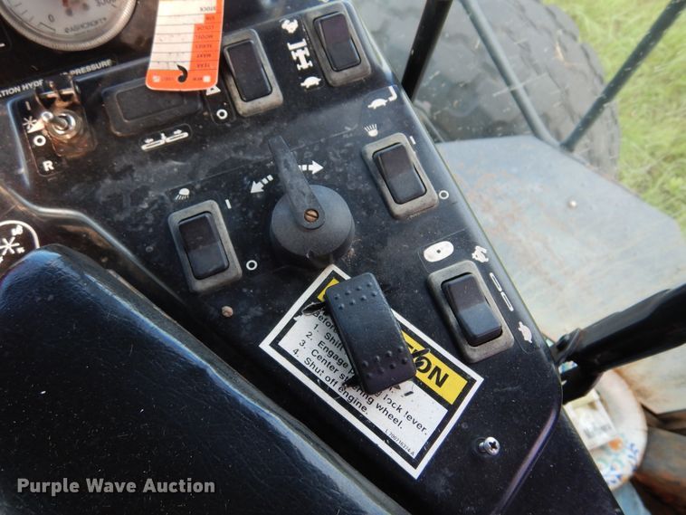 image for item DM5030 1999 Hesston 8550  windrower