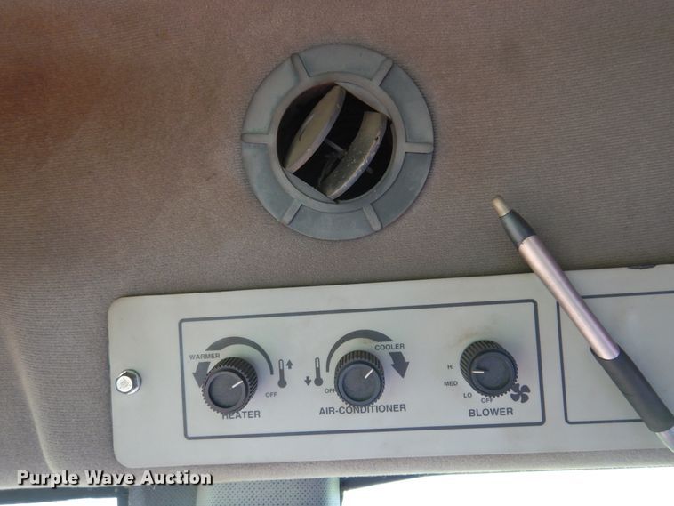 image for item DM5030 1999 Hesston 8550  windrower