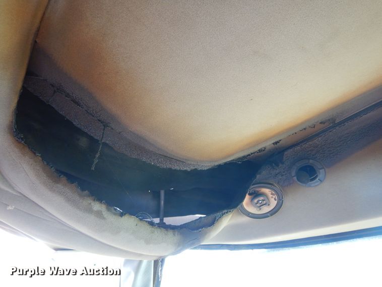 image for item DM5030 1999 Hesston 8550  windrower