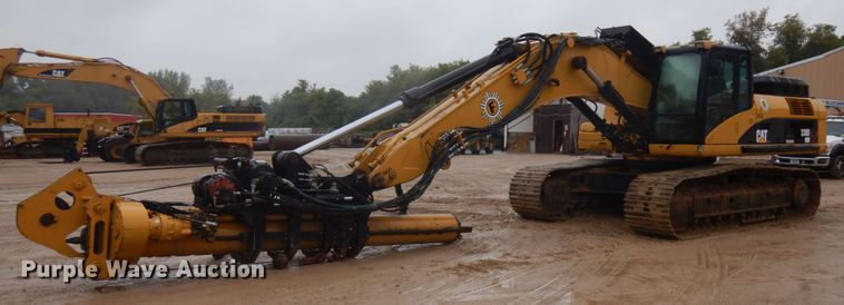 image for item DI1111 2007 Caterpillar 330DL  excavator with Bay Shore Systems LoDril drilling rig