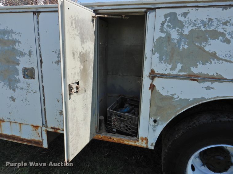 image for item JX9906 1990 Mack CS200P  utility / service truck