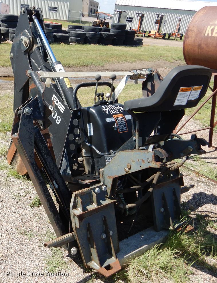 image for item DL6289 2001 Edge  skid steer backhoe