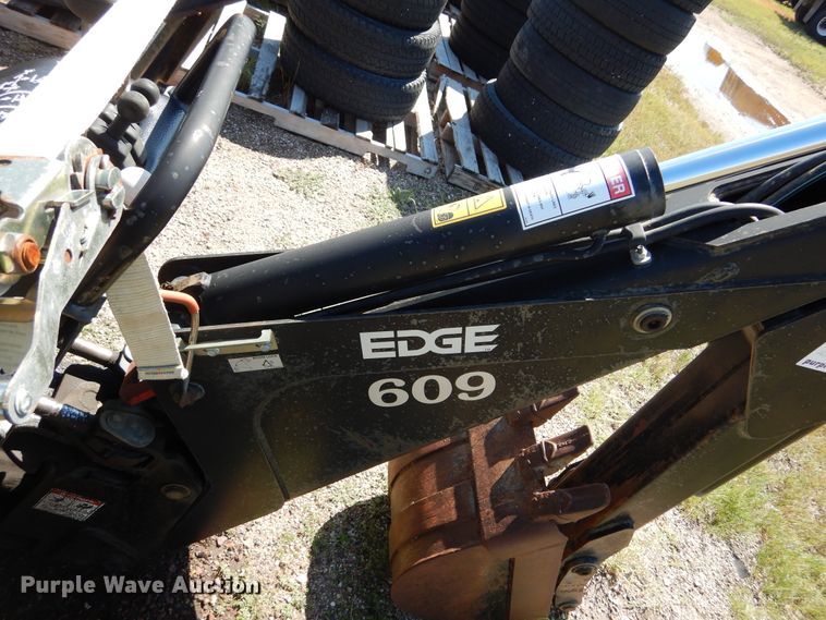 image for item DL6289 2001 Edge  skid steer backhoe