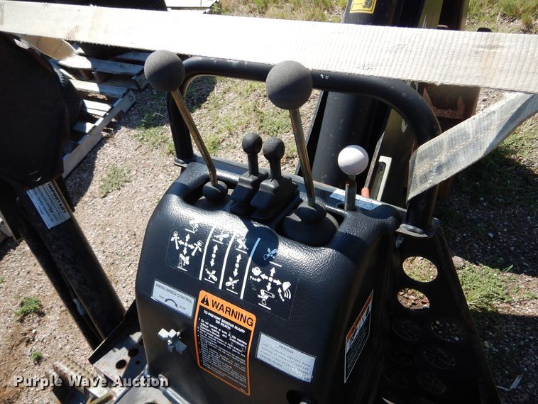 image for item DL6289 2001 Edge  skid steer backhoe