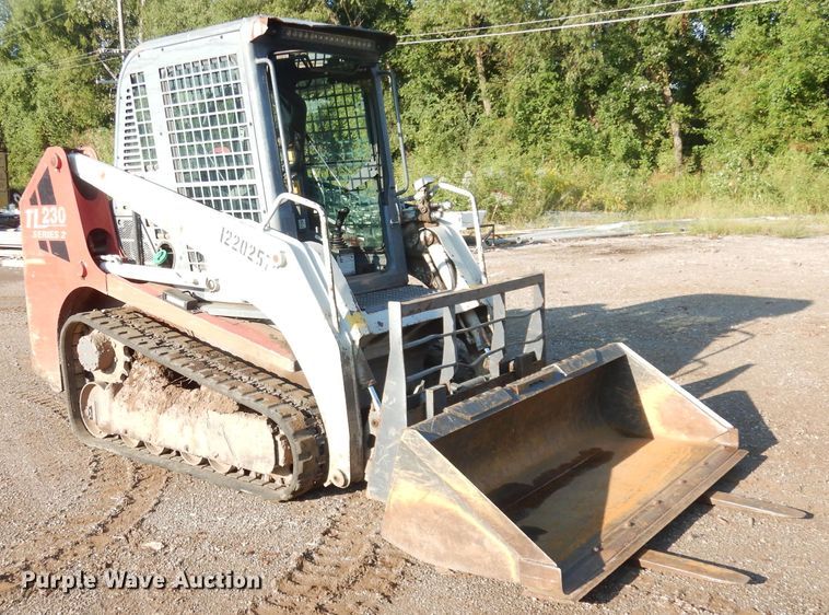 image for item DG0870 2011 Takeuchi TL230 Series II  tracked skid steer loader