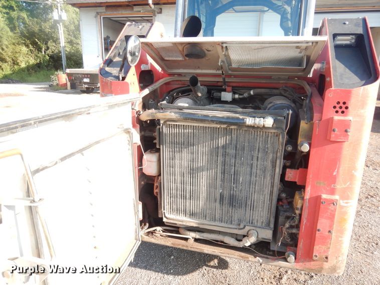 image for item DG0870 2011 Takeuchi TL230 Series II  tracked skid steer loader