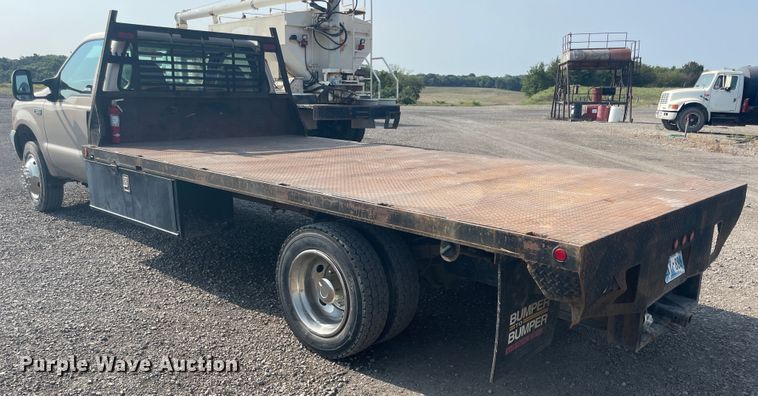 image for item JQ9659 1999 Ford F550 Super Duty  flatbed truck