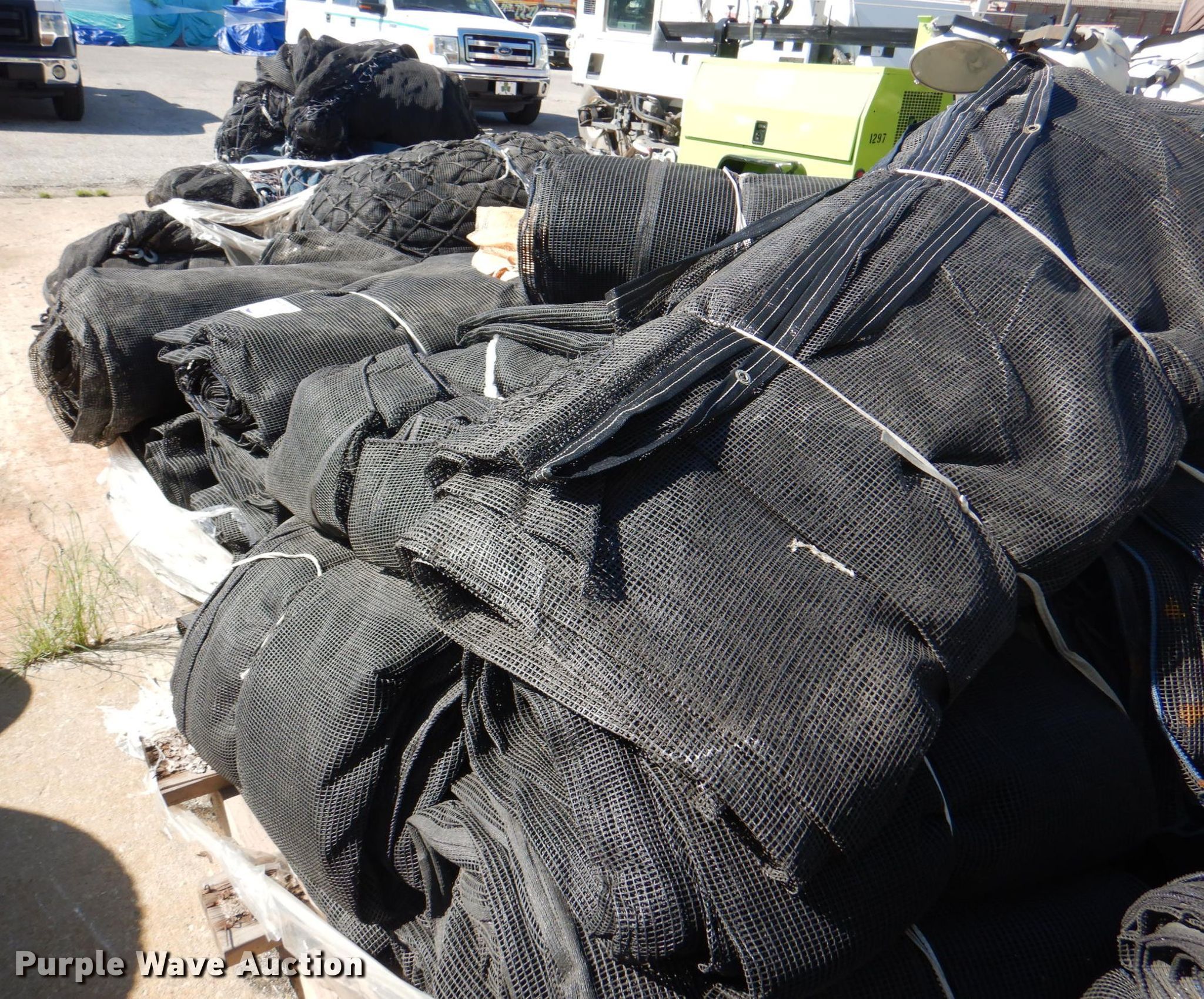 Approximately 30 tarps in Kansas City, KS Item DL0124 sold Purple Wave