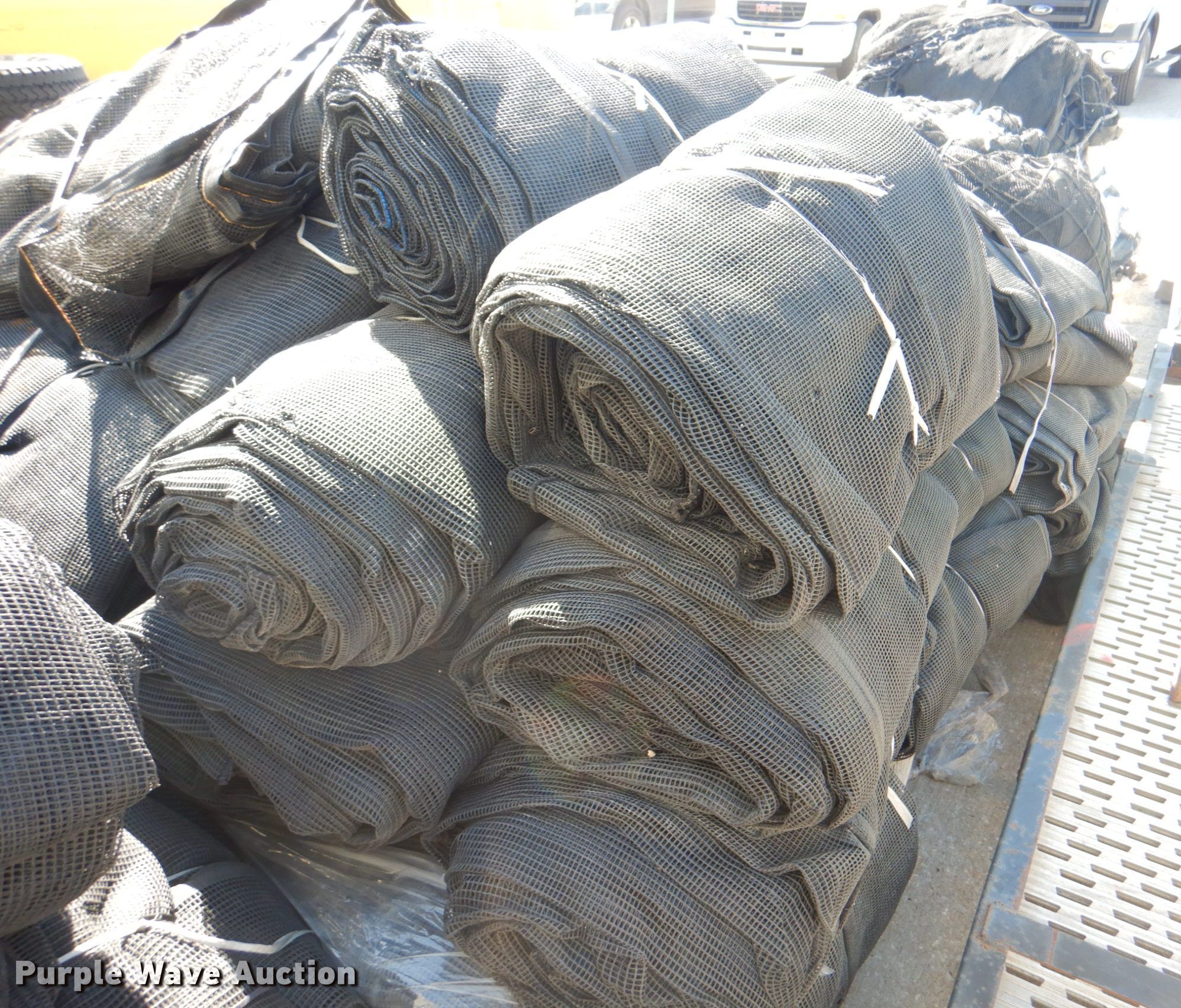 Approximately 30 tarps in Kansas City, KS Item DL0124 sold Purple Wave