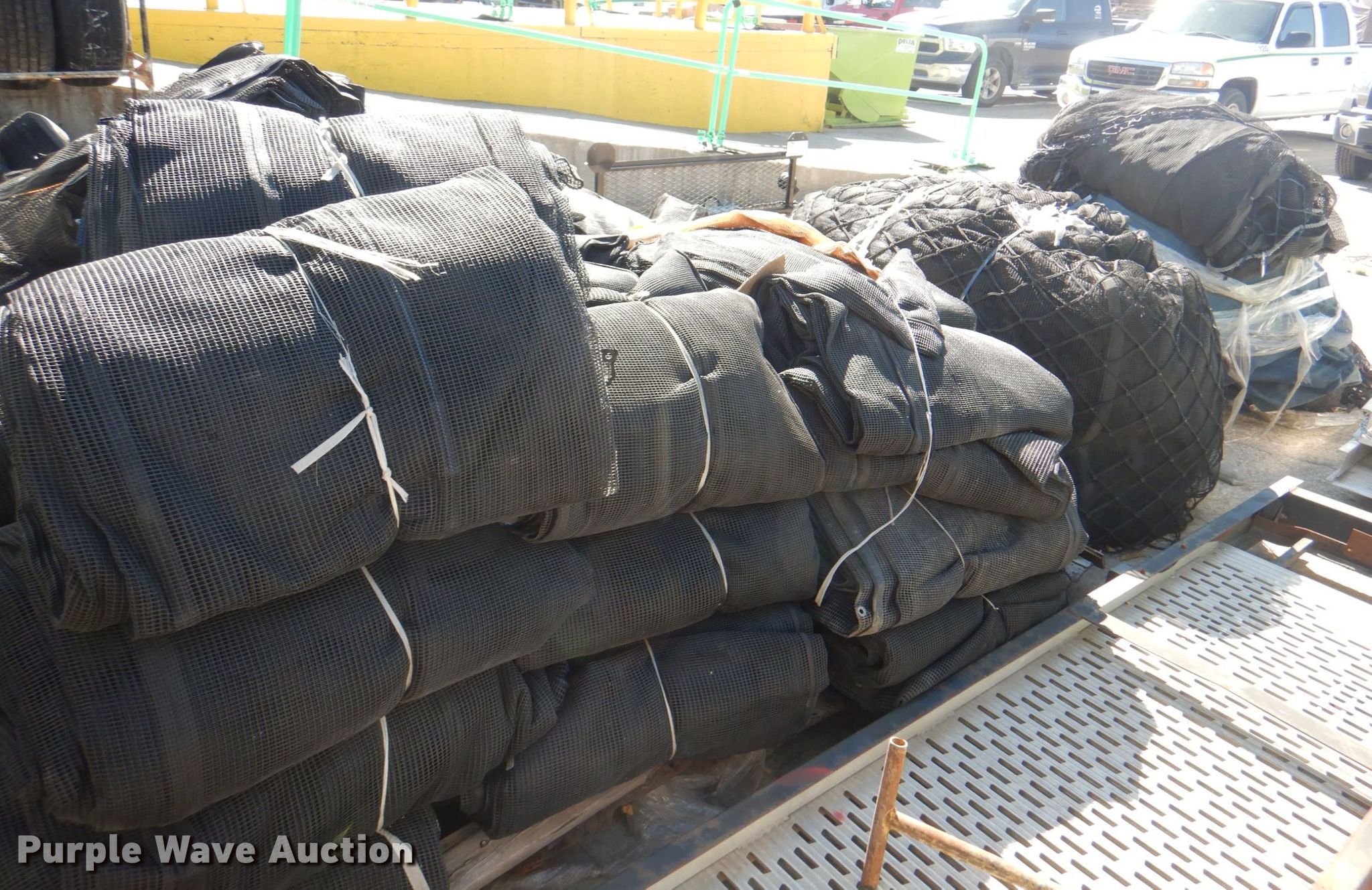 Approximately 30 tarps in Kansas City, KS Item DL0124 sold Purple Wave