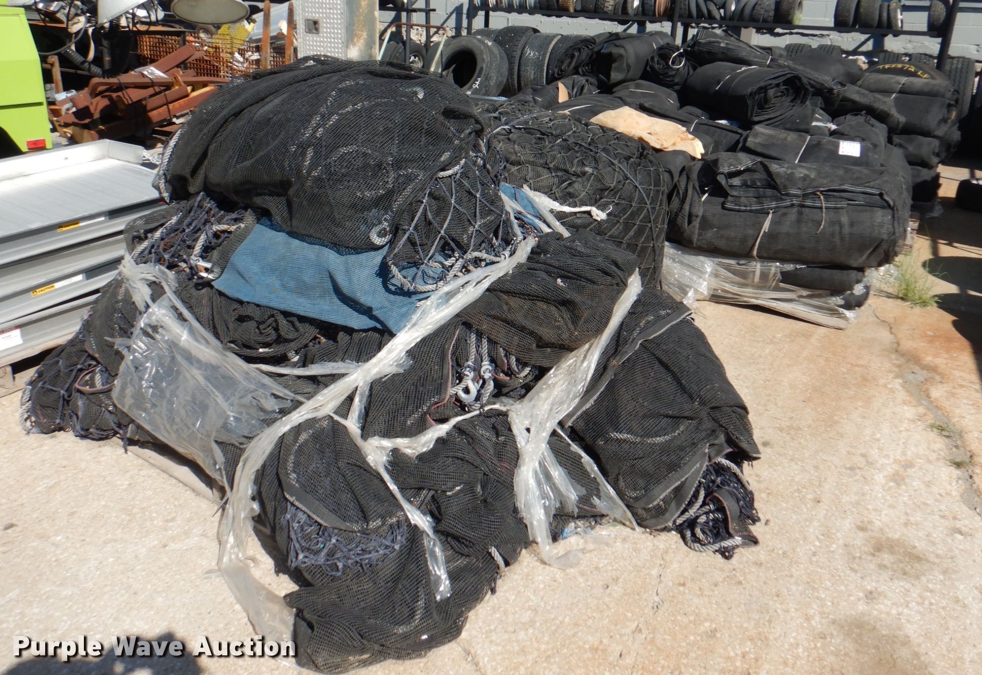 Approximately 30 tarps in Kansas City, KS Item DL0124 sold Purple Wave