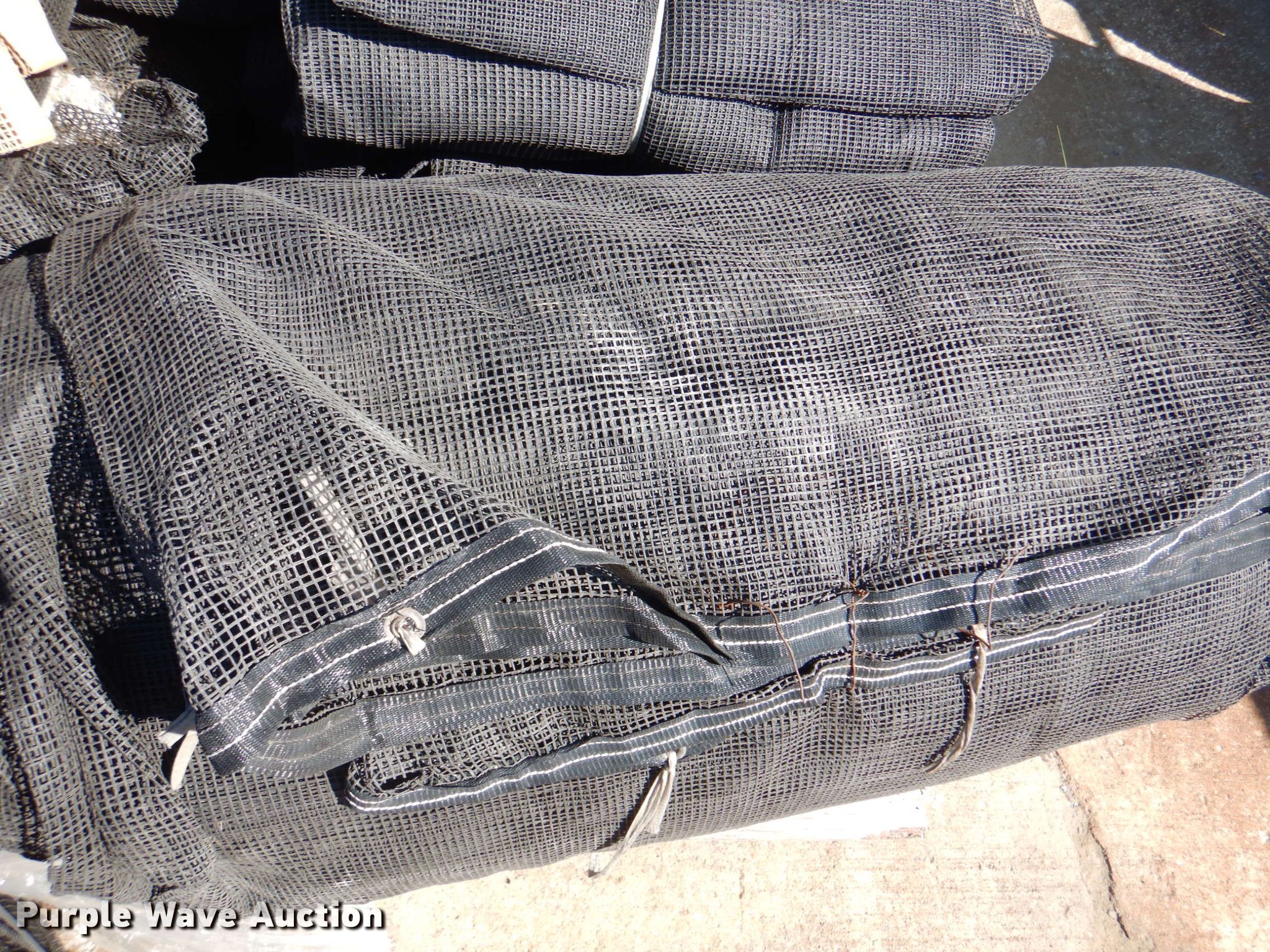 Approximately 30 tarps in Kansas City, KS Item DL0124 sold Purple Wave