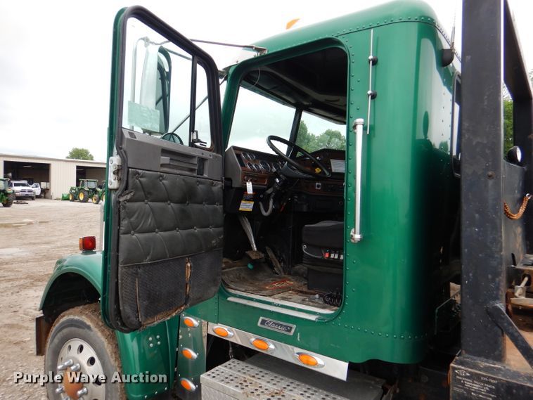 image for item DL8144 2007 Freightliner Classic  rollback truck