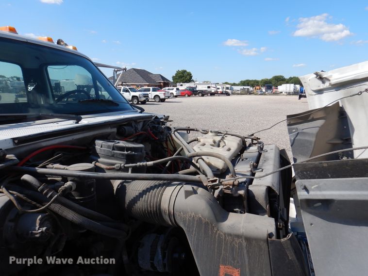 image for item DM6439 1999 Ford F800  vacuum truck