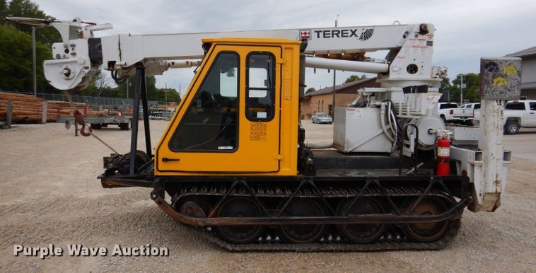 image for item IN9969 1998 Bombardier Muskeg  track carrier with digger derrick