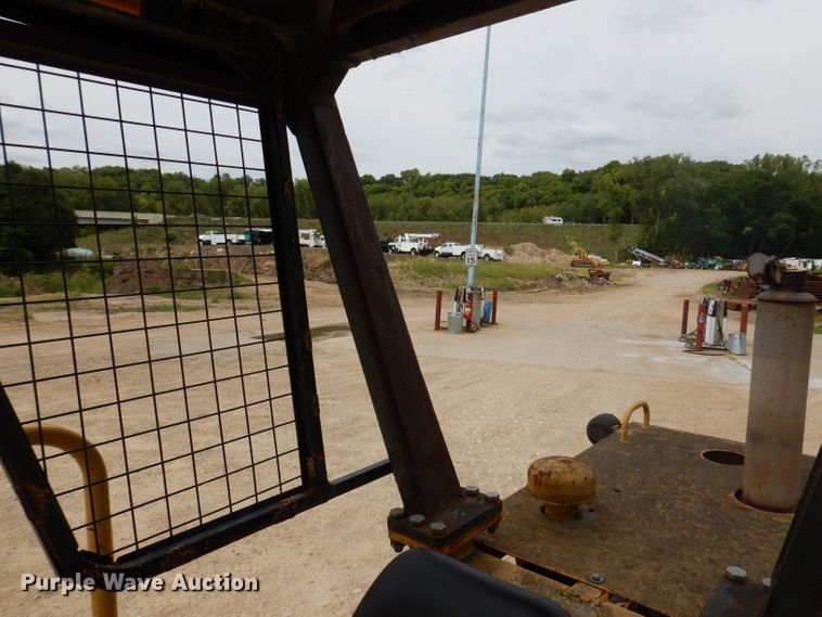 image for item IN9984 1987 Caterpillar CP-323  single drum vibratory roller