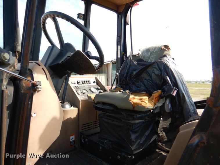 image for item IR9126 1997 John Deere 310E  backhoe