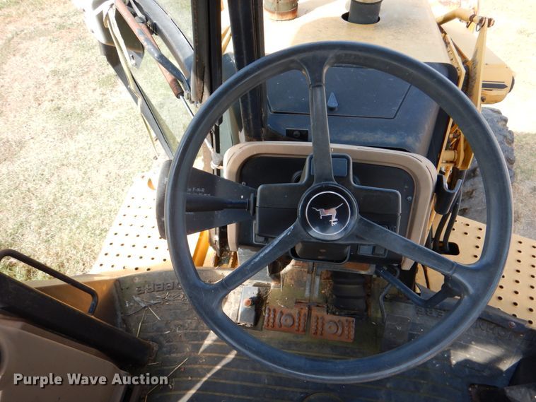 image for item IR9126 1997 John Deere 310E  backhoe