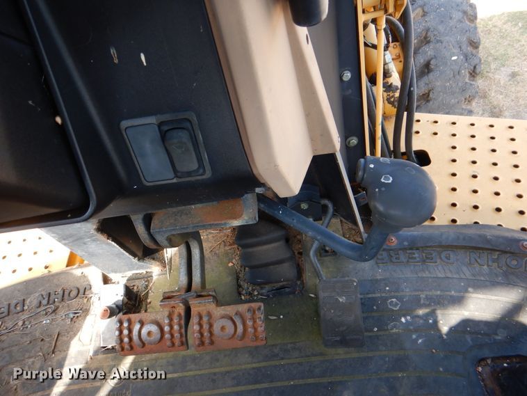 image for item IR9126 1997 John Deere 310E  backhoe