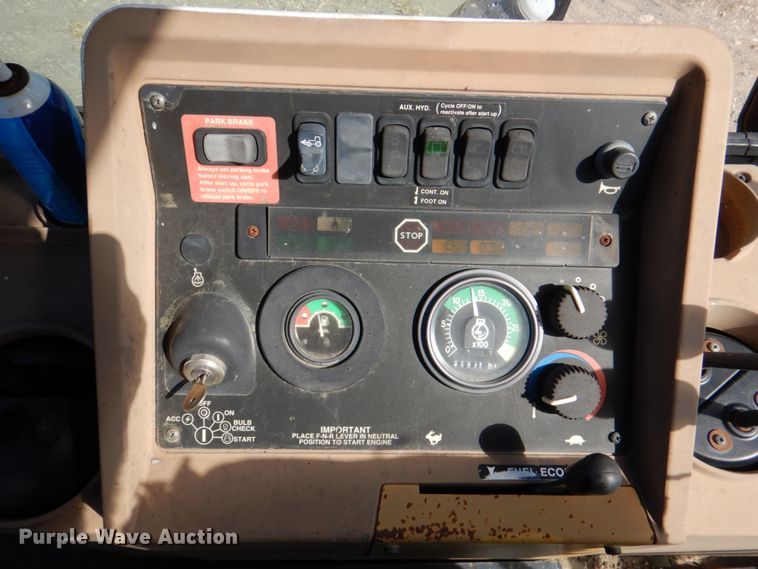 image for item IR9126 1997 John Deere 310E  backhoe