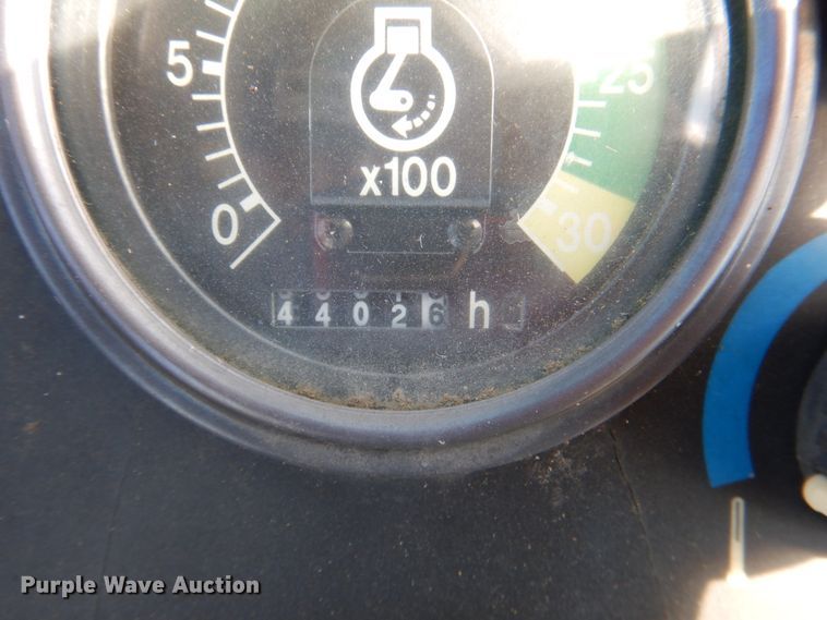 image for item IR9126 1997 John Deere 310E  backhoe