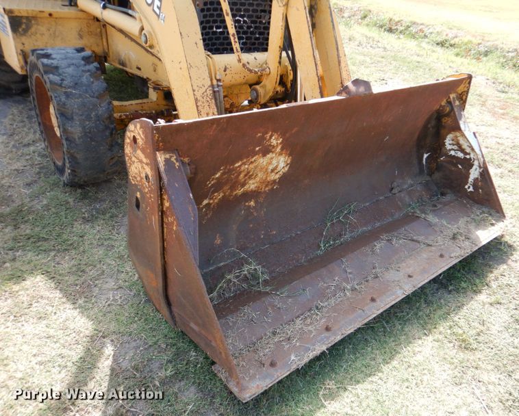 image for item IR9126 1997 John Deere 310E  backhoe
