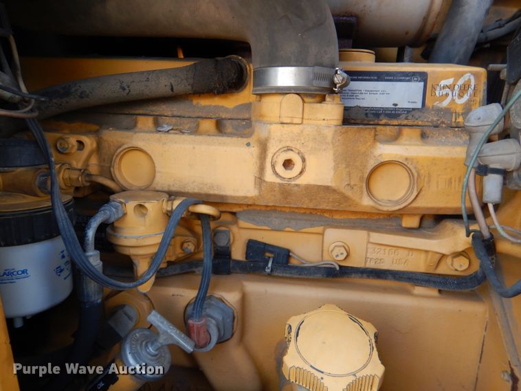 image for item IR9126 1997 John Deere 310E  backhoe