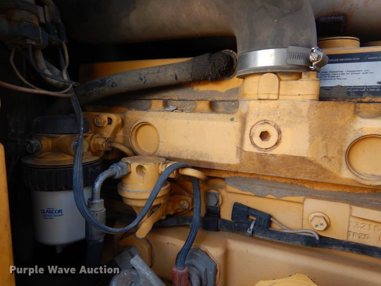 image for item IR9126 1997 John Deere 310E  backhoe