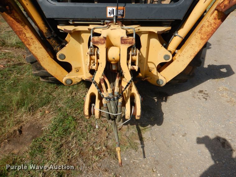 image for item IR9126 1997 John Deere 310E  backhoe