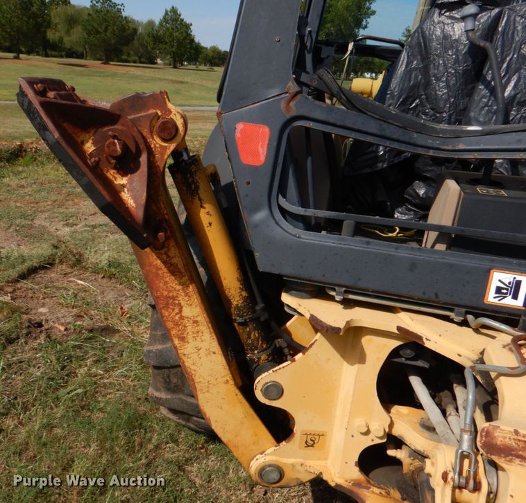 image for item IR9126 1997 John Deere 310E  backhoe