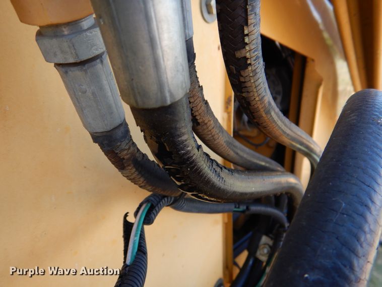 image for item IR9126 1997 John Deere 310E  backhoe