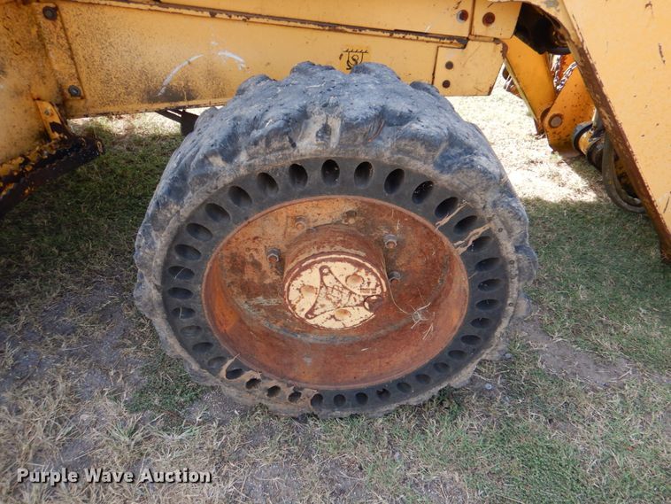 image for item IR9126 1997 John Deere 310E  backhoe