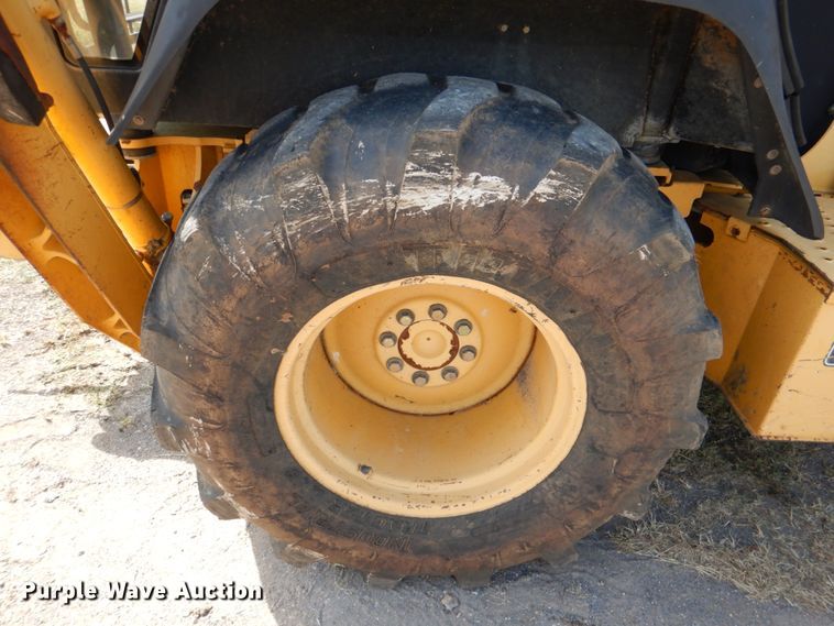 image for item IR9126 1997 John Deere 310E  backhoe