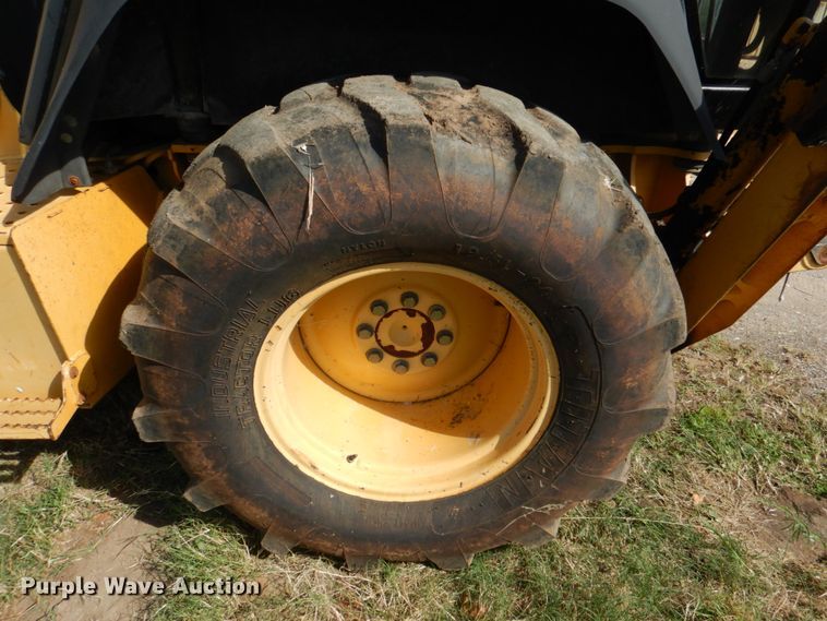 image for item IR9126 1997 John Deere 310E  backhoe