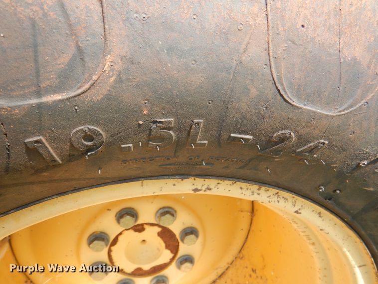 image for item IR9126 1997 John Deere 310E  backhoe