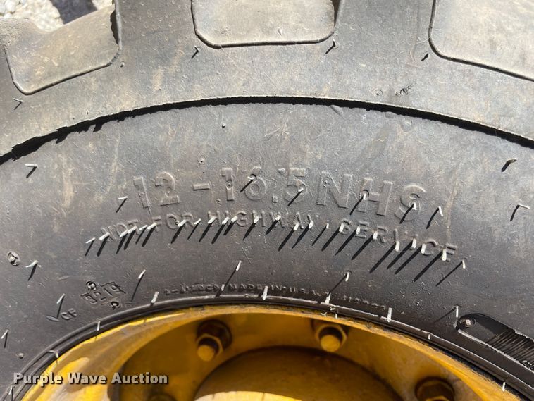 image for item JQ9620 2003 John Deere 310G  backhoe