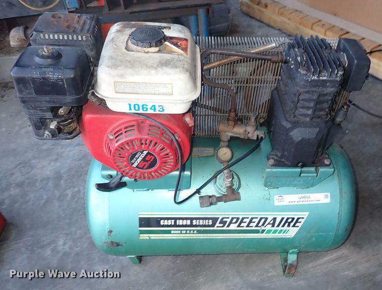 Speedaire air compressor in Wichita, KS Item IJ9954 sold Purple Wave