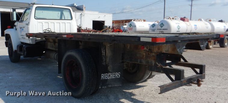 image for item JG9144 1987 Ford F700  flatbed truck