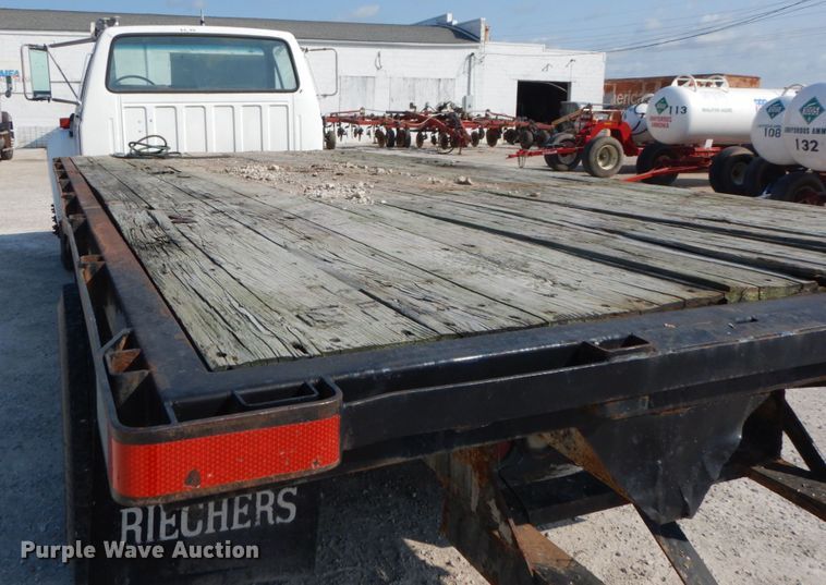 image for item JG9144 1987 Ford F700  flatbed truck