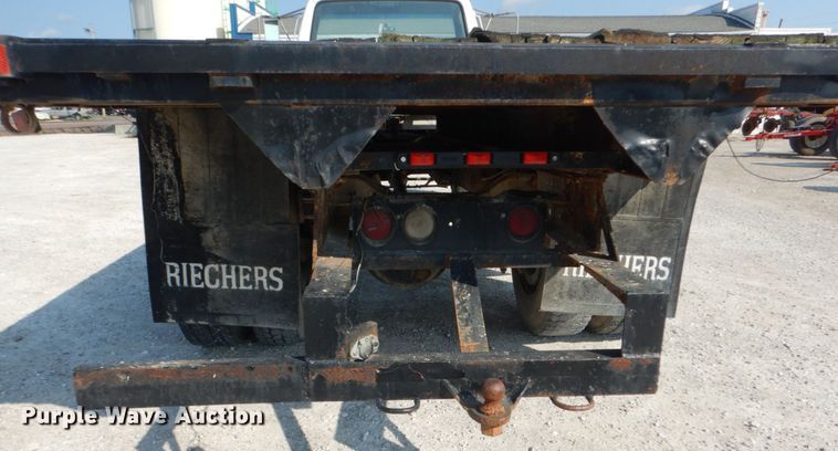 image for item JG9144 1987 Ford F700  flatbed truck