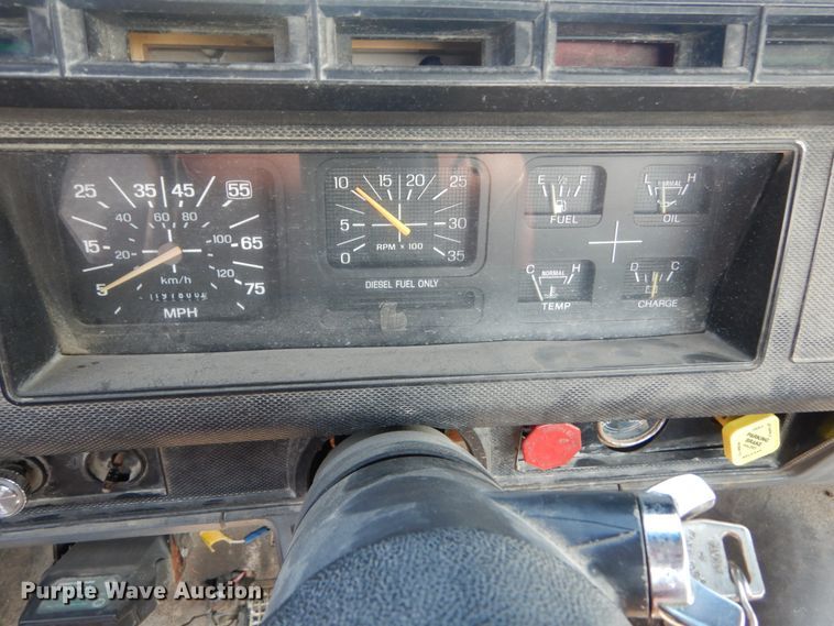 image for item JG9144 1987 Ford F700  flatbed truck