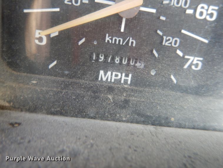 image for item JG9144 1987 Ford F700  flatbed truck