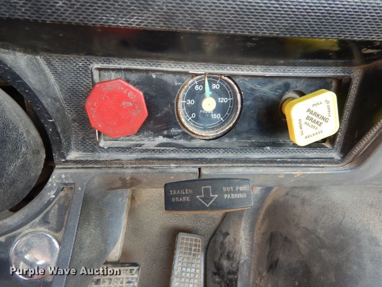 image for item JG9144 1987 Ford F700  flatbed truck