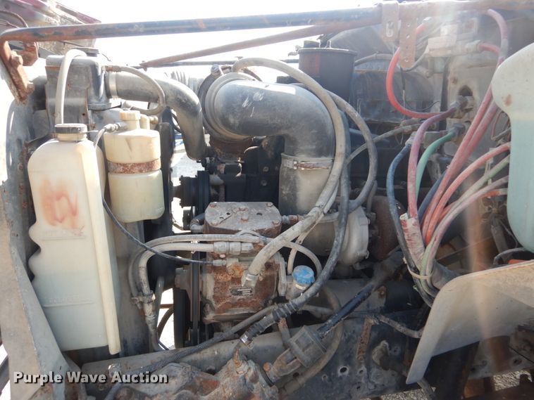 image for item JG9144 1987 Ford F700  flatbed truck